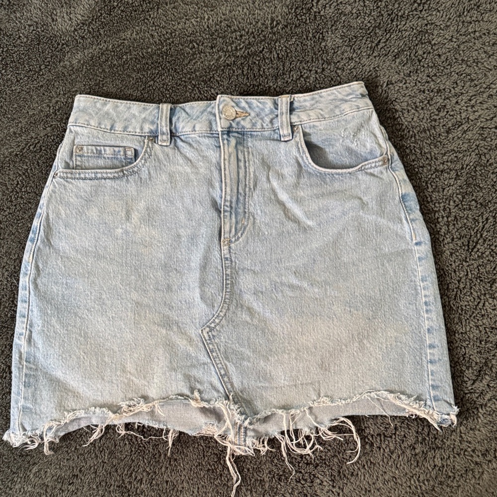 Light Blue Denim Skirt with Frayed Hem